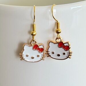 Hello Kitty Gold-Trim Enamel Earrings in White and Red